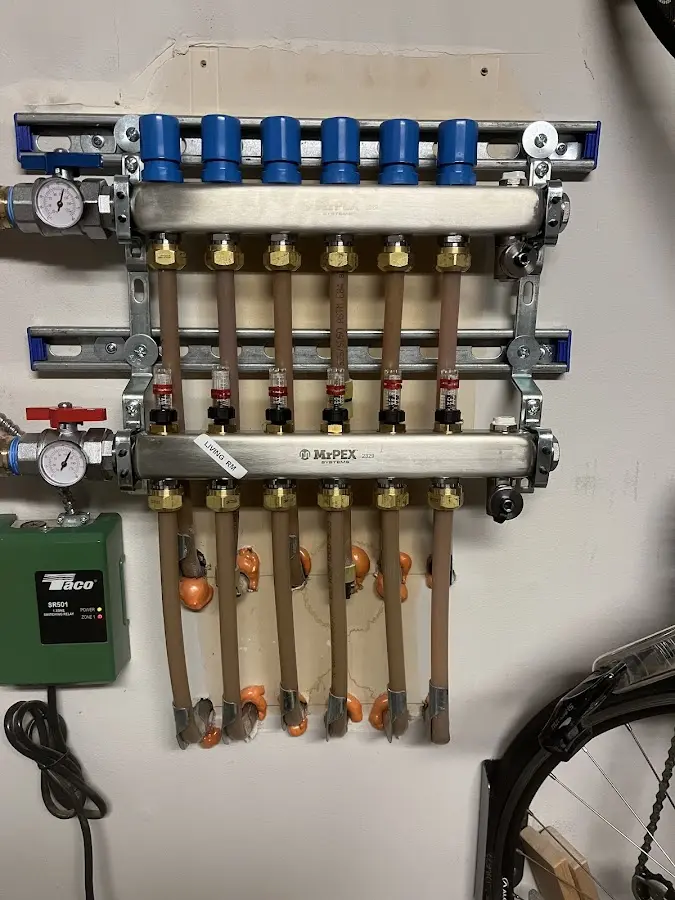 Plumber performing Water Heater Repair at a residential property in Laureldale