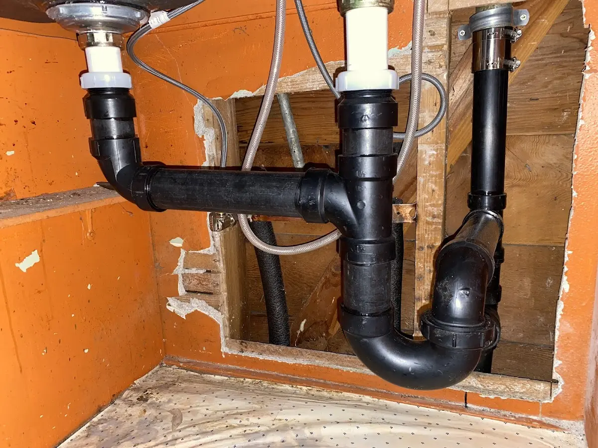 Professional Garbage Disposal Repair equipment and tools on the job in Laureldale